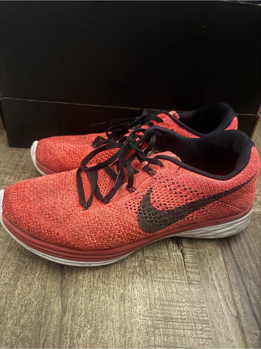 Nike Men’s Red and Black Flyknit Running Shoes